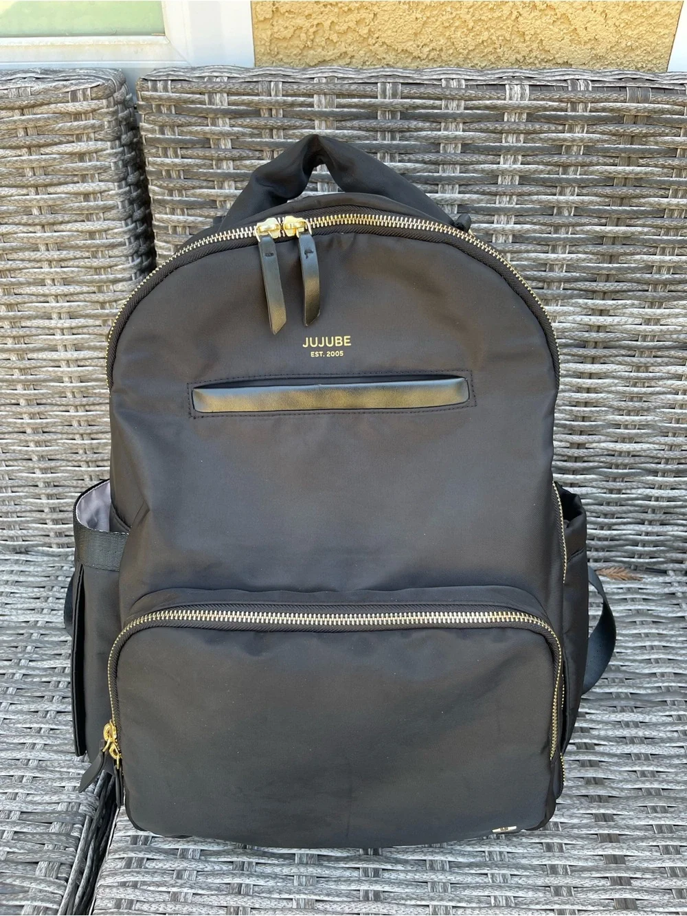 JuJuBe Black Backpack with Gold Hardware, and portable changing pad included